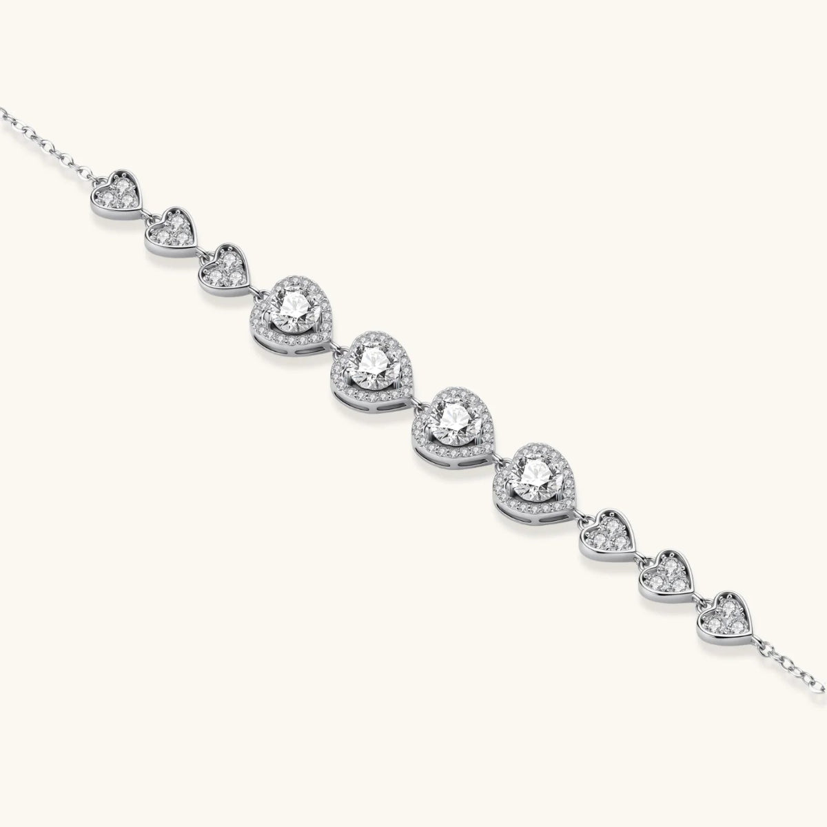 Complete jewelry set with heart-shaped sterling silver pieces featuring brilliant moissanite stones.